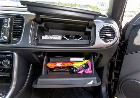 Enter the length or pattern for better results. . Cars storage compartment crossword